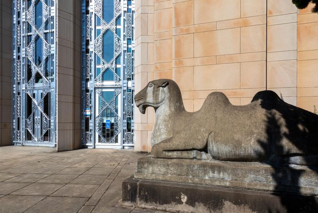 Asian Art Museum camel in front of the building's Art Deco doorway